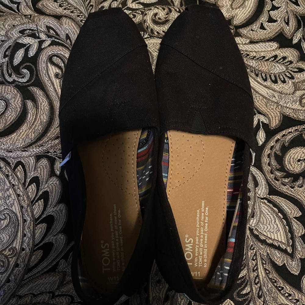 Like New Toms Slip Ons!